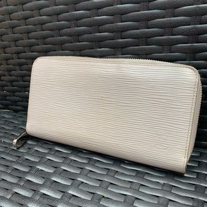 Louis Vuitton Epi zippy wallet with yellow